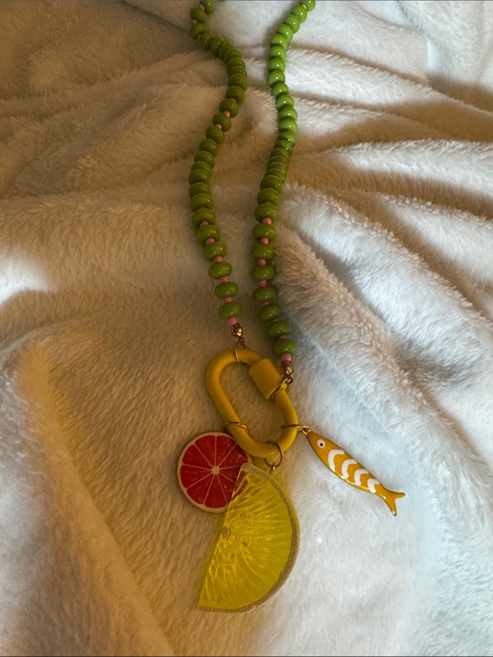 Green Beaded Necklace with Yellow Citrus & Fish Charms